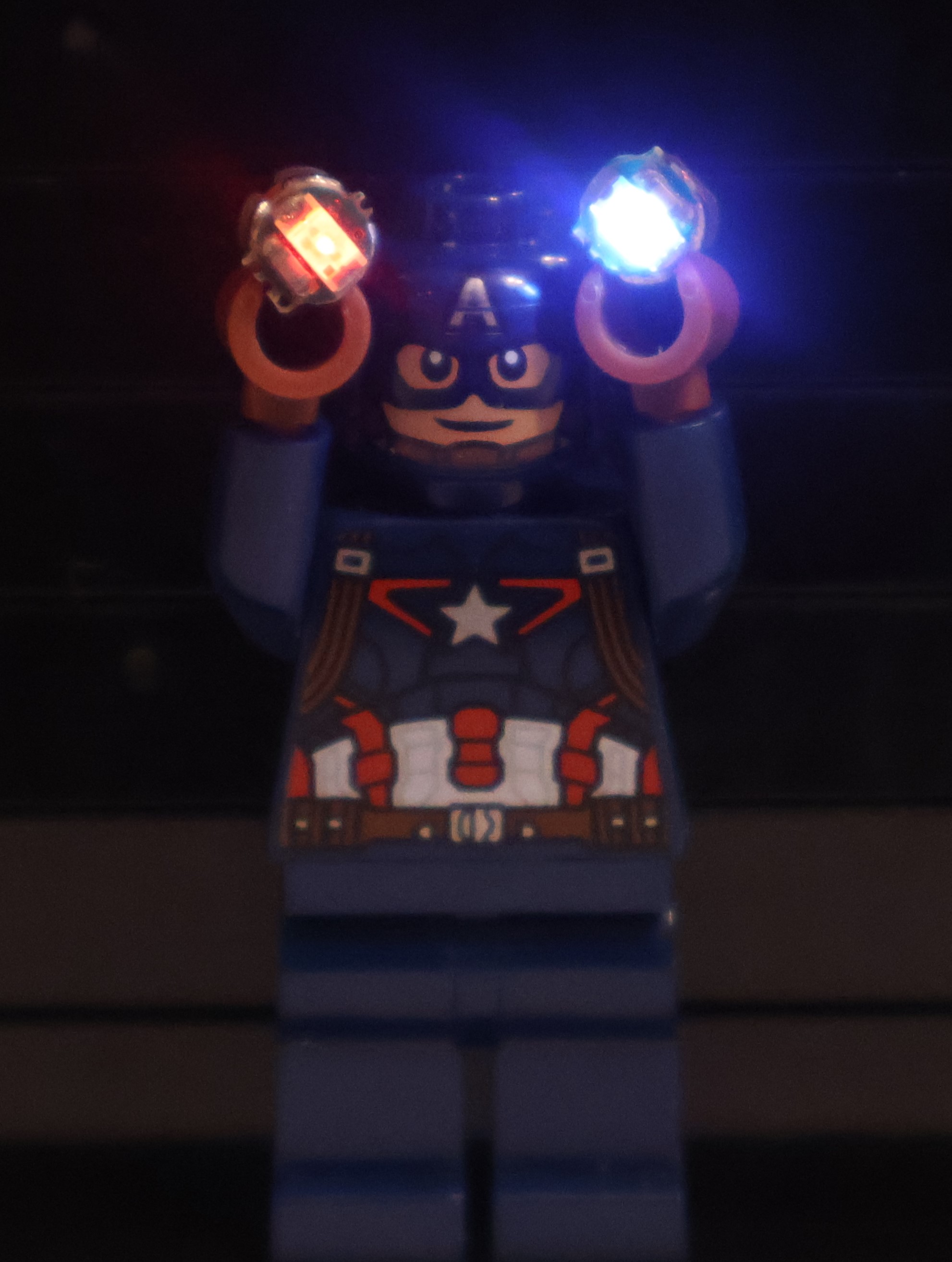 Captain America holds two LEDs Captain America holds two LEDs